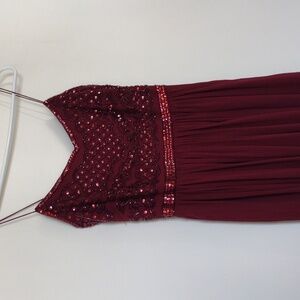 Red floor length dress Adriana Papelli